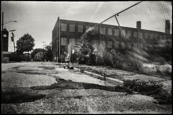 grocery cart closed building fencea